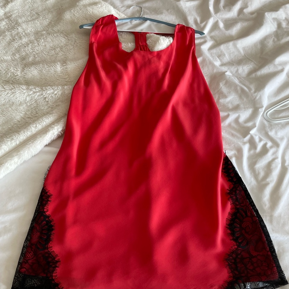 Red flowy summer dress with lace on lower sides 100% silk.